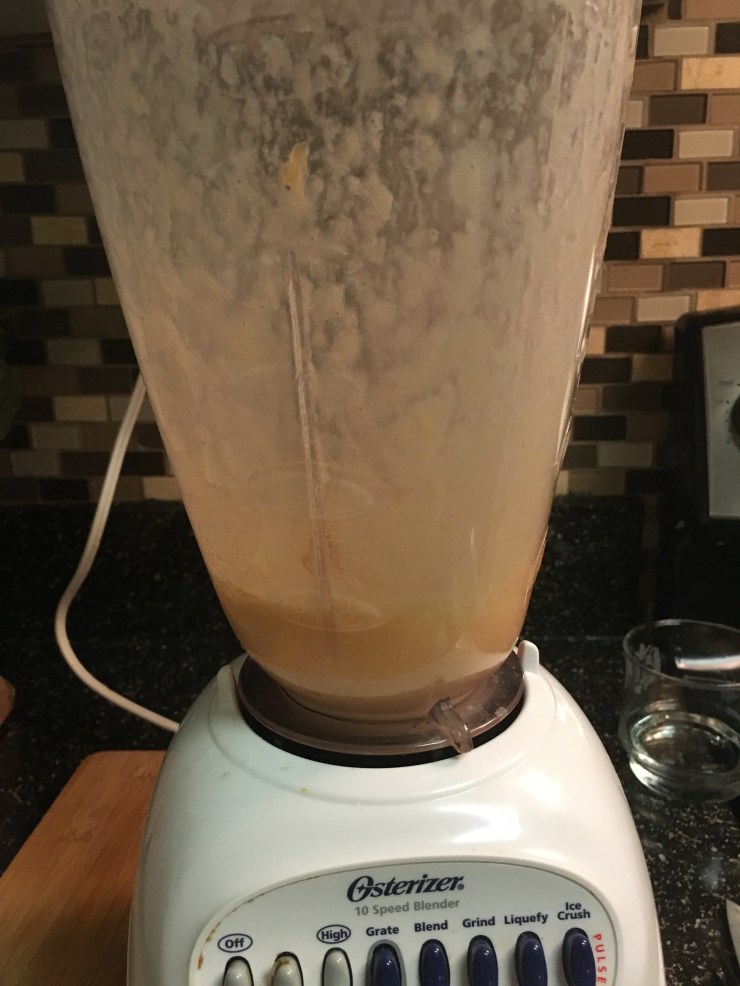 Cantaloupe in a blender.