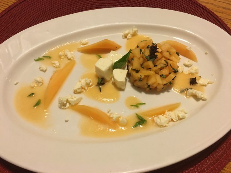 Cantaloupe salad, feta cheese, cantaloupe sauce and Thai basil.