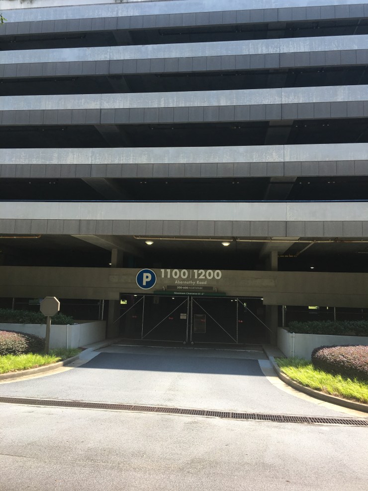 The front of a parking garage.