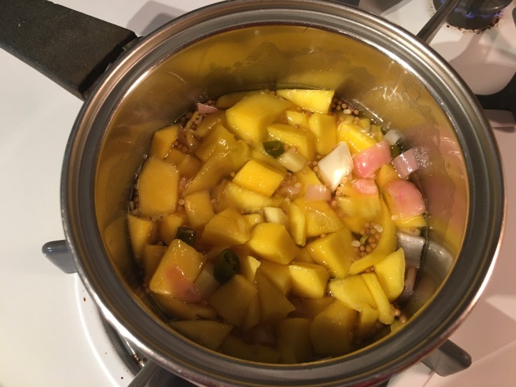 Simmering mango chutney.