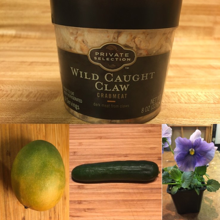 Crab, mango, cucumber and pansies.