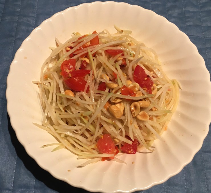 Som Tam in a bowl.
