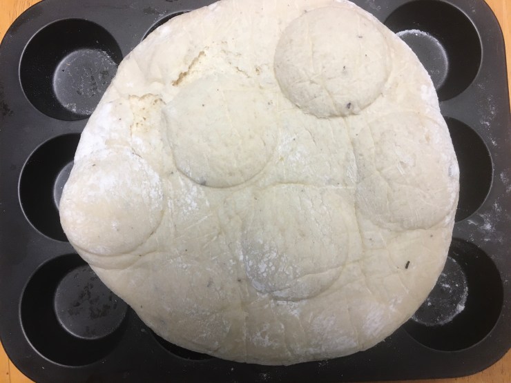 Bread on a muffin tin.