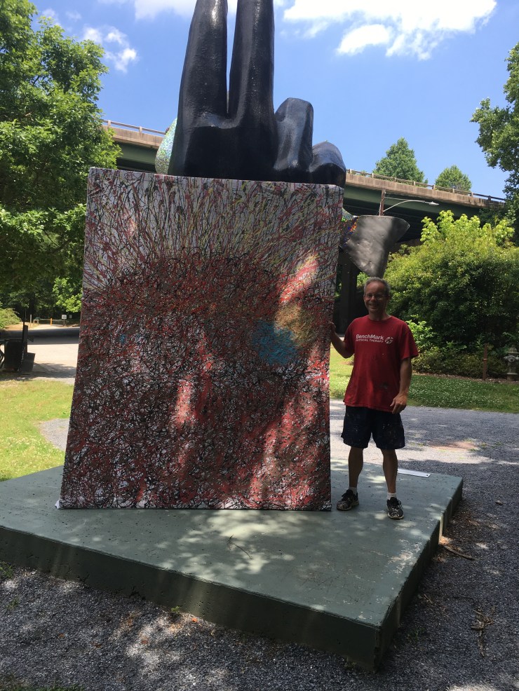 Me standing with drip painting