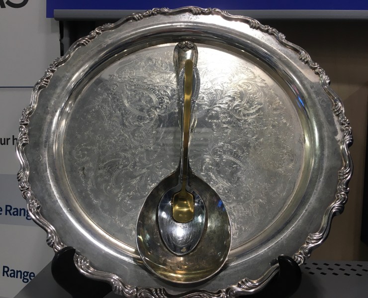 “Flat screen tv disguised as gravy boat”: three spoons glued to sliver tray