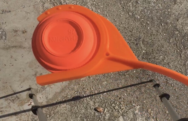 Skeet thrower with skeet inside.