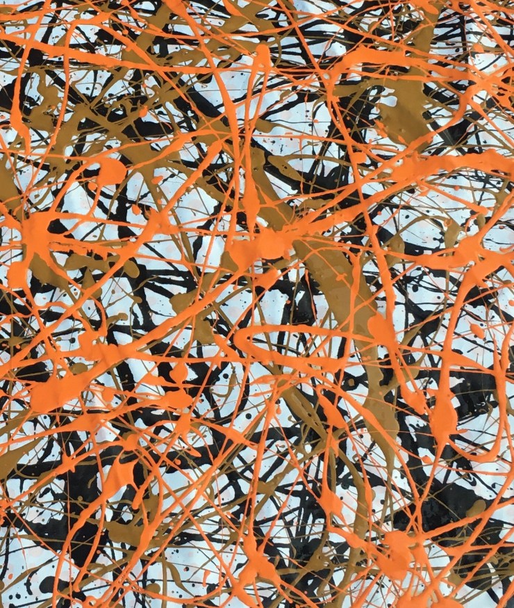 Orange, brown and black paint splatters.