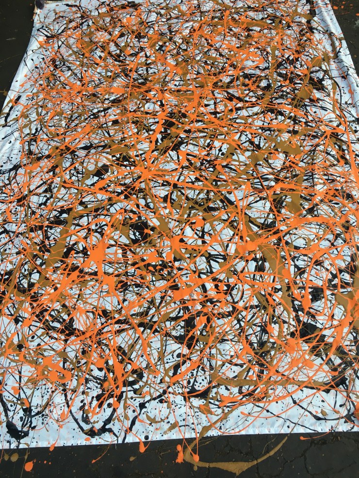 Final coat of orange over brown and black.