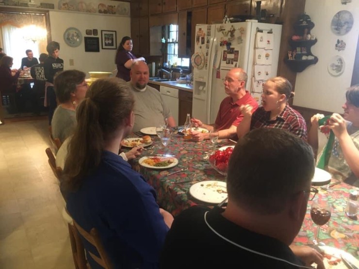 Hardins eating Christmas dinner in the kitchen.