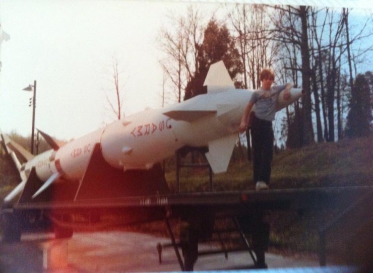 The author in front of a missile.