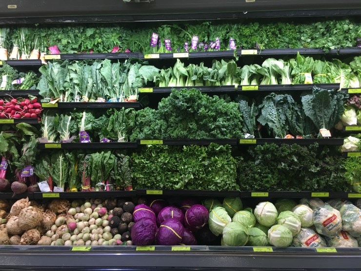 Meticulously arranged vegetables at Whole Foods.