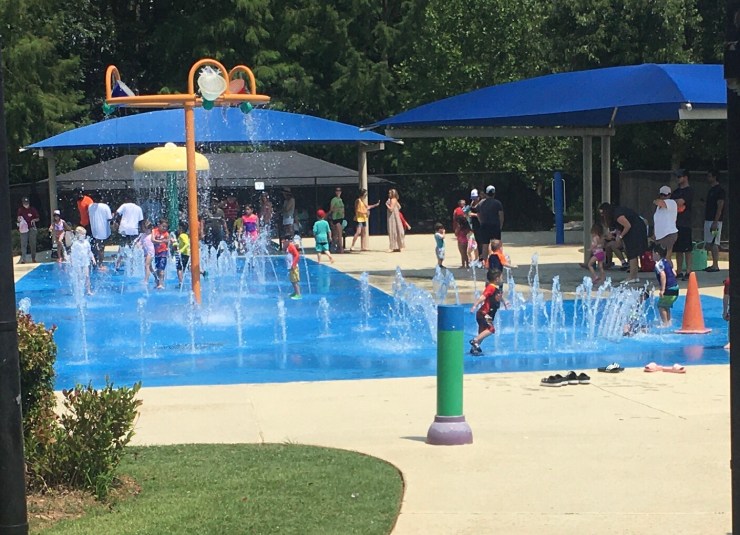 Children playing in a water park.