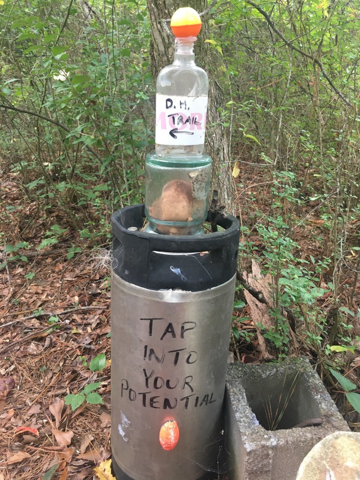 Jars on top of a soda keg.