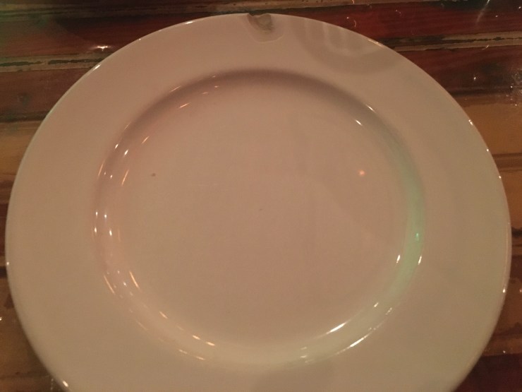 Plate with a chipped edge.