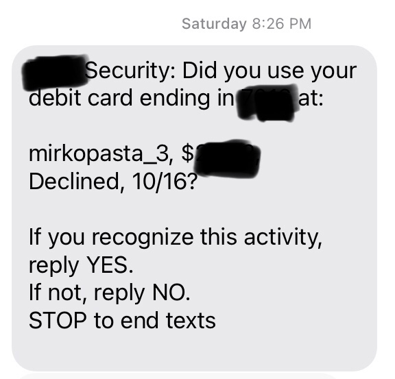 Text message from bank asking about card activity.