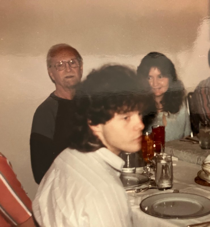 The author sitting in front of his grandfather.